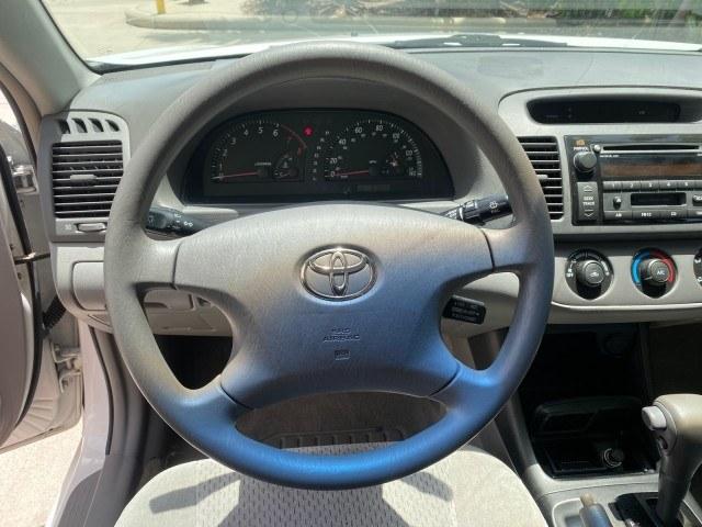 2003 Super White /Stone Toyota Camry LE LOW MILES 61,005 (4T1BF32K63U) with an 3.0L DOHC 24-Valve V6 Engine engine, Automatic transmission, located at 4701 North Dixie Hwy, Pompano Beach, FL, 33064, (954) 422-2889, 26.240938, -80.123474 - OUR WEBPAGE FLORIDACARS1.COM HAS OVER 100 PHOTOS AND FREE CARFAX LINK 2003 Toyota Camry LE Sedan 4 DR 3.0L V6 F DOHC 24V Gasoline 28 MPG Front Wheel Drive Features ABS Brakes Air Conditioning Alloy Wheels AM/FM Stereo Automatic Transmission Cassette Player CD Audio Cloth Seats Cruise Control Power L- Photo#47