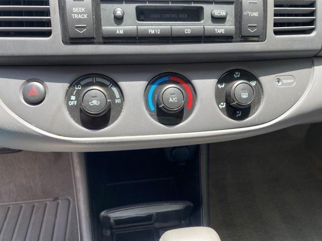 2003 Super White /Stone Toyota Camry LE LOW MILES 61,005 (4T1BF32K63U) with an 3.0L DOHC 24-Valve V6 Engine engine, Automatic transmission, located at 4701 North Dixie Hwy, Pompano Beach, FL, 33064, (954) 422-2889, 26.240938, -80.123474 - OUR WEBPAGE FLORIDACARS1.COM HAS OVER 100 PHOTOS AND FREE CARFAX LINK 2003 Toyota Camry LE Sedan 4 DR 3.0L V6 F DOHC 24V Gasoline 28 MPG Front Wheel Drive Features ABS Brakes Air Conditioning Alloy Wheels AM/FM Stereo Automatic Transmission Cassette Player CD Audio Cloth Seats Cruise Control Power L- Photo#56