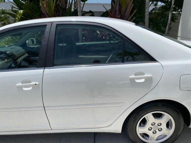2003 Super White /Stone Toyota Camry LE LOW MILES 61,005 (4T1BF32K63U) with an 3.0L DOHC 24-Valve V6 Engine engine, Automatic transmission, located at 4701 North Dixie Hwy, Pompano Beach, FL, 33064, (954) 422-2889, 26.240938, -80.123474 - OUR WEBPAGE FLORIDACARS1.COM HAS OVER 100 PHOTOS AND FREE CARFAX LINK 2003 Toyota Camry LE Sedan 4 DR 3.0L V6 F DOHC 24V Gasoline 28 MPG Front Wheel Drive Features ABS Brakes Air Conditioning Alloy Wheels AM/FM Stereo Automatic Transmission Cassette Player CD Audio Cloth Seats Cruise Control Power L- Photo#69