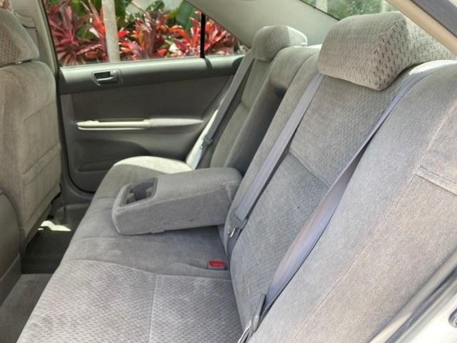2003 Super White /Stone Toyota Camry LE LOW MILES 61,005 (4T1BF32K63U) with an 3.0L DOHC 24-Valve V6 Engine engine, Automatic transmission, located at 4701 North Dixie Hwy, Pompano Beach, FL, 33064, (954) 422-2889, 26.240938, -80.123474 - OUR WEBPAGE FLORIDACARS1.COM HAS OVER 100 PHOTOS AND FREE CARFAX LINK 2003 Toyota Camry LE Sedan 4 DR 3.0L V6 F DOHC 24V Gasoline 28 MPG Front Wheel Drive Features ABS Brakes Air Conditioning Alloy Wheels AM/FM Stereo Automatic Transmission Cassette Player CD Audio Cloth Seats Cruise Control Power L- Photo#73