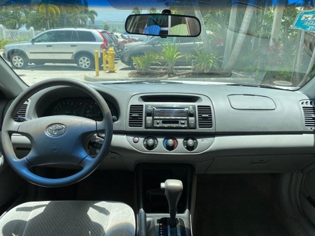 2003 Super White /Stone Toyota Camry LE LOW MILES 61,005 (4T1BF32K63U) with an 3.0L DOHC 24-Valve V6 Engine engine, Automatic transmission, located at 4701 North Dixie Hwy, Pompano Beach, FL, 33064, (954) 422-2889, 26.240938, -80.123474 - OUR WEBPAGE FLORIDACARS1.COM HAS OVER 100 PHOTOS AND FREE CARFAX LINK 2003 Toyota Camry LE Sedan 4 DR 3.0L V6 F DOHC 24V Gasoline 28 MPG Front Wheel Drive Features ABS Brakes Air Conditioning Alloy Wheels AM/FM Stereo Automatic Transmission Cassette Player CD Audio Cloth Seats Cruise Control Power L- Photo#78