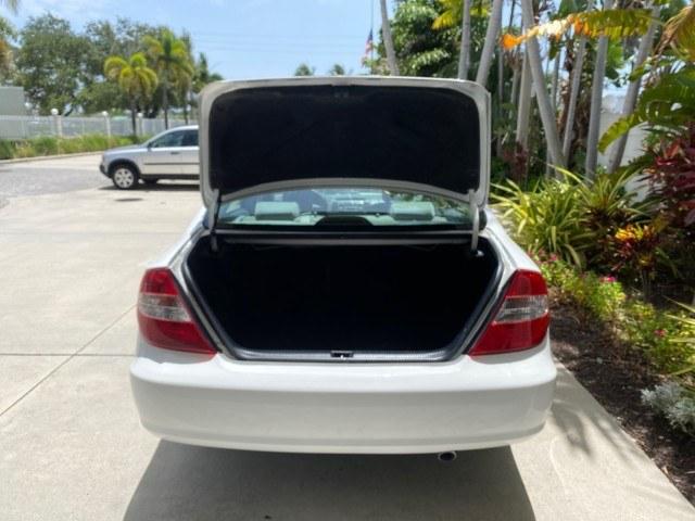 2003 Super White /Stone Toyota Camry LE LOW MILES 61,005 (4T1BF32K63U) with an 3.0L DOHC 24-Valve V6 Engine engine, Automatic transmission, located at 4701 North Dixie Hwy, Pompano Beach, FL, 33064, (954) 422-2889, 26.240938, -80.123474 - OUR WEBPAGE FLORIDACARS1.COM HAS OVER 100 PHOTOS AND FREE CARFAX LINK 2003 Toyota Camry LE Sedan 4 DR 3.0L V6 F DOHC 24V Gasoline 28 MPG Front Wheel Drive Features ABS Brakes Air Conditioning Alloy Wheels AM/FM Stereo Automatic Transmission Cassette Player CD Audio Cloth Seats Cruise Control Power L- Photo#89