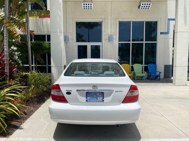 2003 Super White /Stone Toyota Camry LE LOW MILES 61,005 (4T1BF32K63U) with an 3.0L DOHC 24-Valve V6 Engine engine, Automatic transmission, located at 4701 North Dixie Hwy, Pompano Beach, FL, 33064, (954) 422-2889, 26.240938, -80.123474 - OUR WEBPAGE FLORIDACARS1.COM HAS OVER 100 PHOTOS AND FREE CARFAX LINK 2003 Toyota Camry LE Sedan 4 DR 3.0L V6 F DOHC 24V Gasoline 28 MPG Front Wheel Drive Features ABS Brakes Air Conditioning Alloy Wheels AM/FM Stereo Automatic Transmission Cassette Player CD Audio Cloth Seats Cruise Control Power L- Photo#93