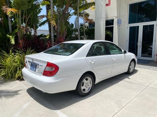 2003 Super White /Stone Toyota Camry LE LOW MILES 61,005 (4T1BF32K63U) with an 3.0L DOHC 24-Valve V6 Engine engine, Automatic transmission, located at 4701 North Dixie Hwy, Pompano Beach, FL, 33064, (954) 422-2889, 26.240938, -80.123474 - OUR WEBPAGE FLORIDACARS1.COM HAS OVER 100 PHOTOS AND FREE CARFAX LINK 2003 Toyota Camry LE Sedan 4 DR 3.0L V6 F DOHC 24V Gasoline 28 MPG Front Wheel Drive Features ABS Brakes Air Conditioning Alloy Wheels AM/FM Stereo Automatic Transmission Cassette Player CD Audio Cloth Seats Cruise Control Power L- Photo#95