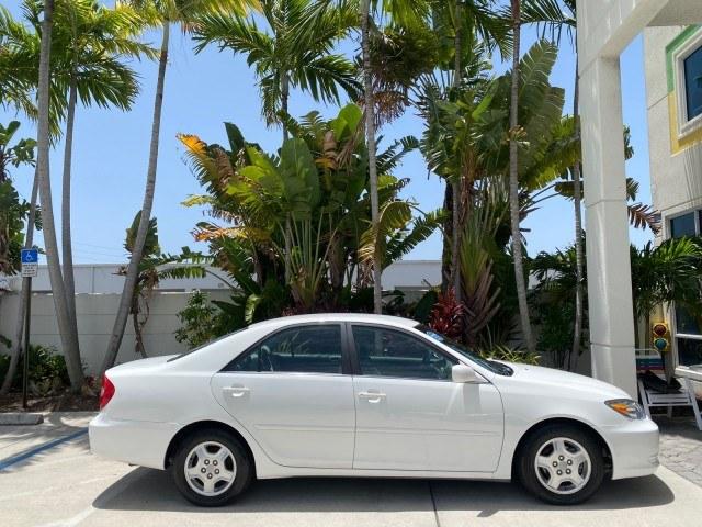 2003 Super White /Stone Toyota Camry LE LOW MILES 61,005 (4T1BF32K63U) with an 3.0L DOHC 24-Valve V6 Engine engine, Automatic transmission, located at 4701 North Dixie Hwy, Pompano Beach, FL, 33064, (954) 422-2889, 26.240938, -80.123474 - OUR WEBPAGE FLORIDACARS1.COM HAS OVER 100 PHOTOS AND FREE CARFAX LINK 2003 Toyota Camry LE Sedan 4 DR 3.0L V6 F DOHC 24V Gasoline 28 MPG Front Wheel Drive Features ABS Brakes Air Conditioning Alloy Wheels AM/FM Stereo Automatic Transmission Cassette Player CD Audio Cloth Seats Cruise Control Power L- Photo#97