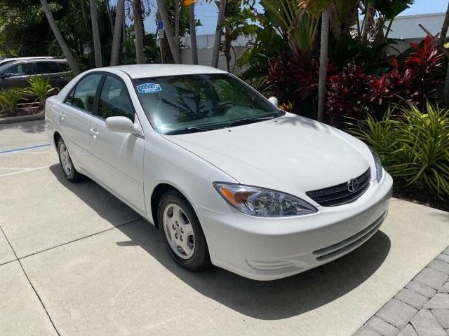 2003 Super White /Stone Toyota Camry LE LOW MILES 61,005 (4T1BF32K63U) with an 3.0L DOHC 24-Valve V6 Engine engine, Automatic transmission, located at 4701 North Dixie Hwy, Pompano Beach, FL, 33064, (954) 422-2889, 26.240938, -80.123474 - OUR WEBPAGE FLORIDACARS1.COM HAS OVER 100 PHOTOS AND FREE CARFAX LINK 2003 Toyota Camry LE Sedan 4 DR 3.0L V6 F DOHC 24V Gasoline 28 MPG Front Wheel Drive Features ABS Brakes Air Conditioning Alloy Wheels AM/FM Stereo Automatic Transmission Cassette Player CD Audio Cloth Seats Cruise Control Power L- Photo#99