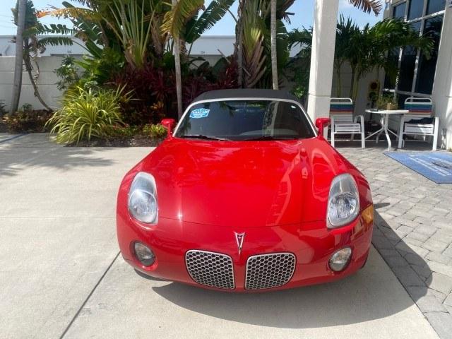 2007 Aggressive (Victory Red) /Ebony Pontiac Solstice LOW MILES 38,147 5SPD AC (1G2MB35B77Y) with an Ecotec 2.4L VVT DOHC 4-Cyl SFI Aluminum Engine engine, Manual transmission, located at 4701 North Dixie Hwy, Pompano Beach, FL, 33064, (954) 422-2889, 26.240938, -80.123474 - OUR WEBPAGE FLORIDACARS1.COM HAS OVER 100 PHOTOS AND FREE CARFAX LINK 2007 Pontiac Solstice Convertible 2.4L I4 F DOHC Gasoline 28 MPG Rear Wheel Drive Features Air Conditioning Alloy Wheels AM/FM Stereo Auxiliary Audio Input CD Audio Cruise Control Leather Seats Manual Transmission Power Locks Powe- Photo#2