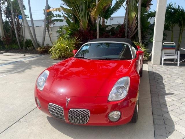2007 Aggressive (Victory Red) /Ebony Pontiac Solstice LOW MILES 38,147 5SPD AC (1G2MB35B77Y) with an Ecotec 2.4L VVT DOHC 4-Cyl SFI Aluminum Engine engine, Manual transmission, located at 4701 North Dixie Hwy, Pompano Beach, FL, 33064, (954) 422-2889, 26.240938, -80.123474 - OUR WEBPAGE FLORIDACARS1.COM HAS OVER 100 PHOTOS AND FREE CARFAX LINK 2007 Pontiac Solstice Convertible 2.4L I4 F DOHC Gasoline 28 MPG Rear Wheel Drive Features Air Conditioning Alloy Wheels AM/FM Stereo Auxiliary Audio Input CD Audio Cruise Control Leather Seats Manual Transmission Power Locks Powe- Photo#3