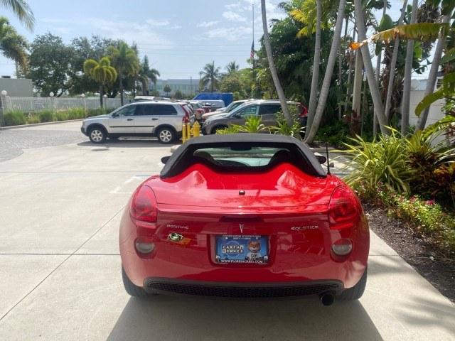 2007 Aggressive (Victory Red) /Ebony Pontiac Solstice LOW MILES 38,147 5SPD AC (1G2MB35B77Y) with an Ecotec 2.4L VVT DOHC 4-Cyl SFI Aluminum Engine engine, Manual transmission, located at 4701 North Dixie Hwy, Pompano Beach, FL, 33064, (954) 422-2889, 26.240938, -80.123474 - OUR WEBPAGE FLORIDACARS1.COM HAS OVER 100 PHOTOS AND FREE CARFAX LINK 2007 Pontiac Solstice Convertible 2.4L I4 F DOHC Gasoline 28 MPG Rear Wheel Drive Features Air Conditioning Alloy Wheels AM/FM Stereo Auxiliary Audio Input CD Audio Cruise Control Leather Seats Manual Transmission Power Locks Powe- Photo#6