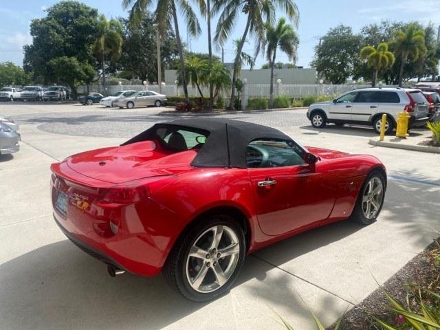 2007 Aggressive (Victory Red) /Ebony Pontiac Solstice LOW MILES 38,147 5SPD AC (1G2MB35B77Y) with an Ecotec 2.4L VVT DOHC 4-Cyl SFI Aluminum Engine engine, Manual transmission, located at 4701 North Dixie Hwy, Pompano Beach, FL, 33064, (954) 422-2889, 26.240938, -80.123474 - OUR WEBPAGE FLORIDACARS1.COM HAS OVER 100 PHOTOS AND FREE CARFAX LINK 2007 Pontiac Solstice Convertible 2.4L I4 F DOHC Gasoline 28 MPG Rear Wheel Drive Features Air Conditioning Alloy Wheels AM/FM Stereo Auxiliary Audio Input CD Audio Cruise Control Leather Seats Manual Transmission Power Locks Powe- Photo#7