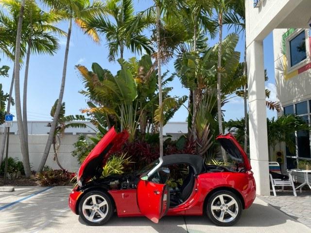 2007 Aggressive (Victory Red) /Ebony Pontiac Solstice LOW MILES 38,147 5SPD AC (1G2MB35B77Y) with an Ecotec 2.4L VVT DOHC 4-Cyl SFI Aluminum Engine engine, Manual transmission, located at 4701 North Dixie Hwy, Pompano Beach, FL, 33064, (954) 422-2889, 26.240938, -80.123474 - OUR WEBPAGE FLORIDACARS1.COM HAS OVER 100 PHOTOS AND FREE CARFAX LINK 2007 Pontiac Solstice Convertible 2.4L I4 F DOHC Gasoline 28 MPG Rear Wheel Drive Features Air Conditioning Alloy Wheels AM/FM Stereo Auxiliary Audio Input CD Audio Cruise Control Leather Seats Manual Transmission Power Locks Powe- Photo#8