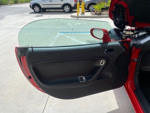 2007 Aggressive (Victory Red) /Ebony Pontiac Solstice LOW MILES 38,147 5SPD AC (1G2MB35B77Y) with an Ecotec 2.4L VVT DOHC 4-Cyl SFI Aluminum Engine engine, Manual transmission, located at 4701 North Dixie Hwy, Pompano Beach, FL, 33064, (954) 422-2889, 26.240938, -80.123474 - OUR WEBPAGE FLORIDACARS1.COM HAS OVER 100 PHOTOS AND FREE CARFAX LINK 2007 Pontiac Solstice Convertible 2.4L I4 F DOHC Gasoline 28 MPG Rear Wheel Drive Features Air Conditioning Alloy Wheels AM/FM Stereo Auxiliary Audio Input CD Audio Cruise Control Leather Seats Manual Transmission Power Locks Powe- Photo#9