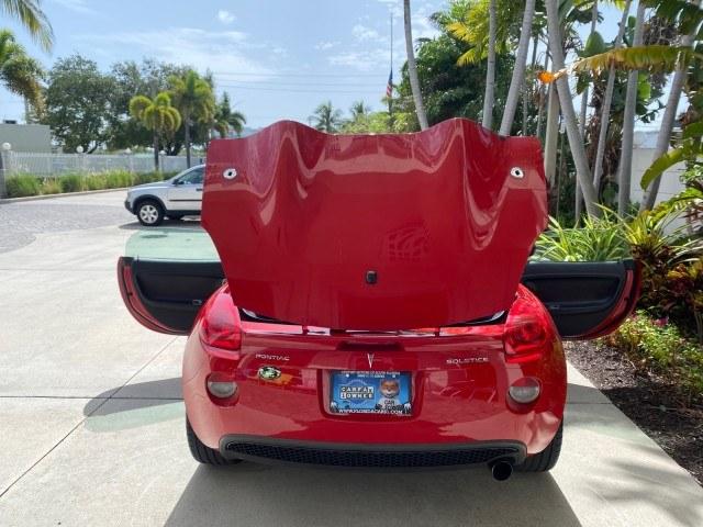 2007 Aggressive (Victory Red) /Ebony Pontiac Solstice LOW MILES 38,147 5SPD AC (1G2MB35B77Y) with an Ecotec 2.4L VVT DOHC 4-Cyl SFI Aluminum Engine engine, Manual transmission, located at 4701 North Dixie Hwy, Pompano Beach, FL, 33064, (954) 422-2889, 26.240938, -80.123474 - OUR WEBPAGE FLORIDACARS1.COM HAS OVER 100 PHOTOS AND FREE CARFAX LINK 2007 Pontiac Solstice Convertible 2.4L I4 F DOHC Gasoline 28 MPG Rear Wheel Drive Features Air Conditioning Alloy Wheels AM/FM Stereo Auxiliary Audio Input CD Audio Cruise Control Leather Seats Manual Transmission Power Locks Powe- Photo#15