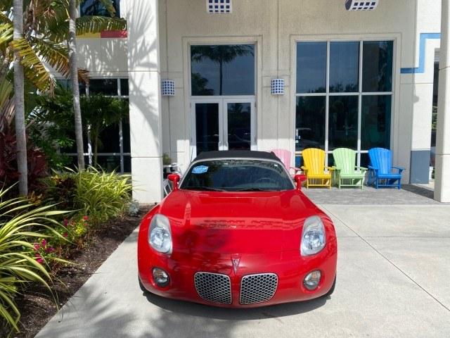 2007 Aggressive (Victory Red) /Ebony Pontiac Solstice LOW MILES 38,147 5SPD AC (1G2MB35B77Y) with an Ecotec 2.4L VVT DOHC 4-Cyl SFI Aluminum Engine engine, Manual transmission, located at 4701 North Dixie Hwy, Pompano Beach, FL, 33064, (954) 422-2889, 26.240938, -80.123474 - OUR WEBPAGE FLORIDACARS1.COM HAS OVER 100 PHOTOS AND FREE CARFAX LINK 2007 Pontiac Solstice Convertible 2.4L I4 F DOHC Gasoline 28 MPG Rear Wheel Drive Features Air Conditioning Alloy Wheels AM/FM Stereo Auxiliary Audio Input CD Audio Cruise Control Leather Seats Manual Transmission Power Locks Powe- Photo#26
