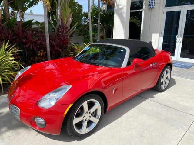 2007 Aggressive (Victory Red) /Ebony Pontiac Solstice LOW MILES 38,147 5SPD AC (1G2MB35B77Y) with an Ecotec 2.4L VVT DOHC 4-Cyl SFI Aluminum Engine engine, Manual transmission, located at 4701 North Dixie Hwy, Pompano Beach, FL, 33064, (954) 422-2889, 26.240938, -80.123474 - OUR WEBPAGE FLORIDACARS1.COM HAS OVER 100 PHOTOS AND FREE CARFAX LINK 2007 Pontiac Solstice Convertible 2.4L I4 F DOHC Gasoline 28 MPG Rear Wheel Drive Features Air Conditioning Alloy Wheels AM/FM Stereo Auxiliary Audio Input CD Audio Cruise Control Leather Seats Manual Transmission Power Locks Powe- Photo#29