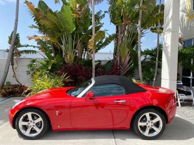 2007 Aggressive (Victory Red) /Ebony Pontiac Solstice LOW MILES 38,147 5SPD AC (1G2MB35B77Y) with an Ecotec 2.4L VVT DOHC 4-Cyl SFI Aluminum Engine engine, Manual transmission, located at 4701 North Dixie Hwy, Pompano Beach, FL, 33064, (954) 422-2889, 26.240938, -80.123474 - OUR WEBPAGE FLORIDACARS1.COM HAS OVER 100 PHOTOS AND FREE CARFAX LINK 2007 Pontiac Solstice Convertible 2.4L I4 F DOHC Gasoline 28 MPG Rear Wheel Drive Features Air Conditioning Alloy Wheels AM/FM Stereo Auxiliary Audio Input CD Audio Cruise Control Leather Seats Manual Transmission Power Locks Powe- Photo#31