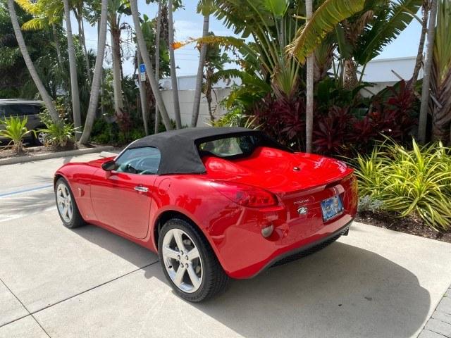 2007 Aggressive (Victory Red) /Ebony Pontiac Solstice LOW MILES 38,147 5SPD AC (1G2MB35B77Y) with an Ecotec 2.4L VVT DOHC 4-Cyl SFI Aluminum Engine engine, Manual transmission, located at 4701 North Dixie Hwy, Pompano Beach, FL, 33064, (954) 422-2889, 26.240938, -80.123474 - OUR WEBPAGE FLORIDACARS1.COM HAS OVER 100 PHOTOS AND FREE CARFAX LINK 2007 Pontiac Solstice Convertible 2.4L I4 F DOHC Gasoline 28 MPG Rear Wheel Drive Features Air Conditioning Alloy Wheels AM/FM Stereo Auxiliary Audio Input CD Audio Cruise Control Leather Seats Manual Transmission Power Locks Powe- Photo#32