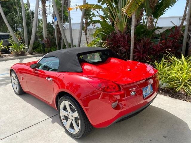 2007 Aggressive (Victory Red) /Ebony Pontiac Solstice LOW MILES 38,147 5SPD AC (1G2MB35B77Y) with an Ecotec 2.4L VVT DOHC 4-Cyl SFI Aluminum Engine engine, Manual transmission, located at 4701 North Dixie Hwy, Pompano Beach, FL, 33064, (954) 422-2889, 26.240938, -80.123474 - OUR WEBPAGE FLORIDACARS1.COM HAS OVER 100 PHOTOS AND FREE CARFAX LINK 2007 Pontiac Solstice Convertible 2.4L I4 F DOHC Gasoline 28 MPG Rear Wheel Drive Features Air Conditioning Alloy Wheels AM/FM Stereo Auxiliary Audio Input CD Audio Cruise Control Leather Seats Manual Transmission Power Locks Powe- Photo#33