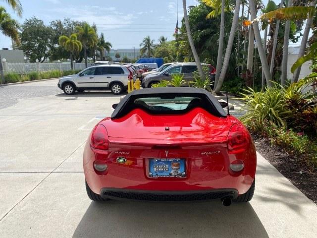 2007 Aggressive (Victory Red) /Ebony Pontiac Solstice LOW MILES 38,147 5SPD AC (1G2MB35B77Y) with an Ecotec 2.4L VVT DOHC 4-Cyl SFI Aluminum Engine engine, Manual transmission, located at 4701 North Dixie Hwy, Pompano Beach, FL, 33064, (954) 422-2889, 26.240938, -80.123474 - OUR WEBPAGE FLORIDACARS1.COM HAS OVER 100 PHOTOS AND FREE CARFAX LINK 2007 Pontiac Solstice Convertible 2.4L I4 F DOHC Gasoline 28 MPG Rear Wheel Drive Features Air Conditioning Alloy Wheels AM/FM Stereo Auxiliary Audio Input CD Audio Cruise Control Leather Seats Manual Transmission Power Locks Powe- Photo#34