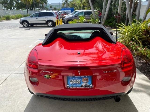 2007 Aggressive (Victory Red) /Ebony Pontiac Solstice LOW MILES 38,147 5SPD AC (1G2MB35B77Y) with an Ecotec 2.4L VVT DOHC 4-Cyl SFI Aluminum Engine engine, Manual transmission, located at 4701 North Dixie Hwy, Pompano Beach, FL, 33064, (954) 422-2889, 26.240938, -80.123474 - OUR WEBPAGE FLORIDACARS1.COM HAS OVER 100 PHOTOS AND FREE CARFAX LINK 2007 Pontiac Solstice Convertible 2.4L I4 F DOHC Gasoline 28 MPG Rear Wheel Drive Features Air Conditioning Alloy Wheels AM/FM Stereo Auxiliary Audio Input CD Audio Cruise Control Leather Seats Manual Transmission Power Locks Powe- Photo#35