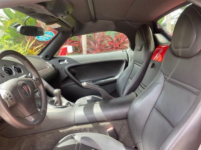 2007 Aggressive (Victory Red) /Ebony Pontiac Solstice LOW MILES 38,147 5SPD AC (1G2MB35B77Y) with an Ecotec 2.4L VVT DOHC 4-Cyl SFI Aluminum Engine engine, Manual transmission, located at 4701 North Dixie Hwy, Pompano Beach, FL, 33064, (954) 422-2889, 26.240938, -80.123474 - OUR WEBPAGE FLORIDACARS1.COM HAS OVER 100 PHOTOS AND FREE CARFAX LINK 2007 Pontiac Solstice Convertible 2.4L I4 F DOHC Gasoline 28 MPG Rear Wheel Drive Features Air Conditioning Alloy Wheels AM/FM Stereo Auxiliary Audio Input CD Audio Cruise Control Leather Seats Manual Transmission Power Locks Powe- Photo#45