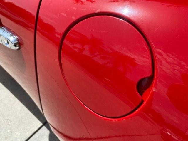 2007 Aggressive (Victory Red) /Ebony Pontiac Solstice LOW MILES 38,147 5SPD AC (1G2MB35B77Y) with an Ecotec 2.4L VVT DOHC 4-Cyl SFI Aluminum Engine engine, Manual transmission, located at 4701 North Dixie Hwy, Pompano Beach, FL, 33064, (954) 422-2889, 26.240938, -80.123474 - OUR WEBPAGE FLORIDACARS1.COM HAS OVER 100 PHOTOS AND FREE CARFAX LINK 2007 Pontiac Solstice Convertible 2.4L I4 F DOHC Gasoline 28 MPG Rear Wheel Drive Features Air Conditioning Alloy Wheels AM/FM Stereo Auxiliary Audio Input CD Audio Cruise Control Leather Seats Manual Transmission Power Locks Powe- Photo#71