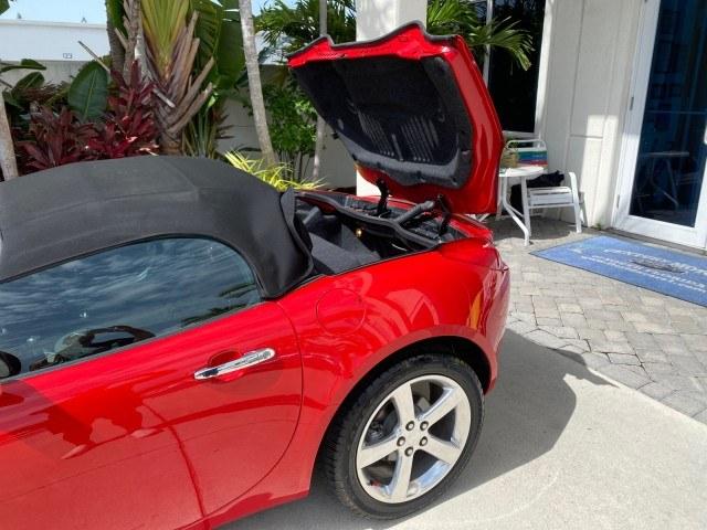 2007 Aggressive (Victory Red) /Ebony Pontiac Solstice LOW MILES 38,147 5SPD AC (1G2MB35B77Y) with an Ecotec 2.4L VVT DOHC 4-Cyl SFI Aluminum Engine engine, Manual transmission, located at 4701 North Dixie Hwy, Pompano Beach, FL, 33064, (954) 422-2889, 26.240938, -80.123474 - OUR WEBPAGE FLORIDACARS1.COM HAS OVER 100 PHOTOS AND FREE CARFAX LINK 2007 Pontiac Solstice Convertible 2.4L I4 F DOHC Gasoline 28 MPG Rear Wheel Drive Features Air Conditioning Alloy Wheels AM/FM Stereo Auxiliary Audio Input CD Audio Cruise Control Leather Seats Manual Transmission Power Locks Powe- Photo#75