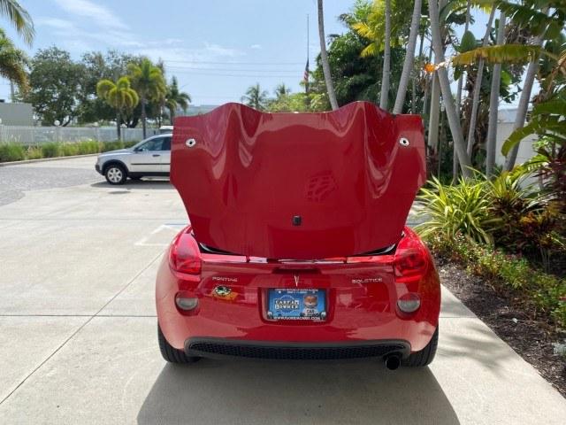 2007 Aggressive (Victory Red) /Ebony Pontiac Solstice LOW MILES 38,147 5SPD AC (1G2MB35B77Y) with an Ecotec 2.4L VVT DOHC 4-Cyl SFI Aluminum Engine engine, Manual transmission, located at 4701 North Dixie Hwy, Pompano Beach, FL, 33064, (954) 422-2889, 26.240938, -80.123474 - OUR WEBPAGE FLORIDACARS1.COM HAS OVER 100 PHOTOS AND FREE CARFAX LINK 2007 Pontiac Solstice Convertible 2.4L I4 F DOHC Gasoline 28 MPG Rear Wheel Drive Features Air Conditioning Alloy Wheels AM/FM Stereo Auxiliary Audio Input CD Audio Cruise Control Leather Seats Manual Transmission Power Locks Powe- Photo#78