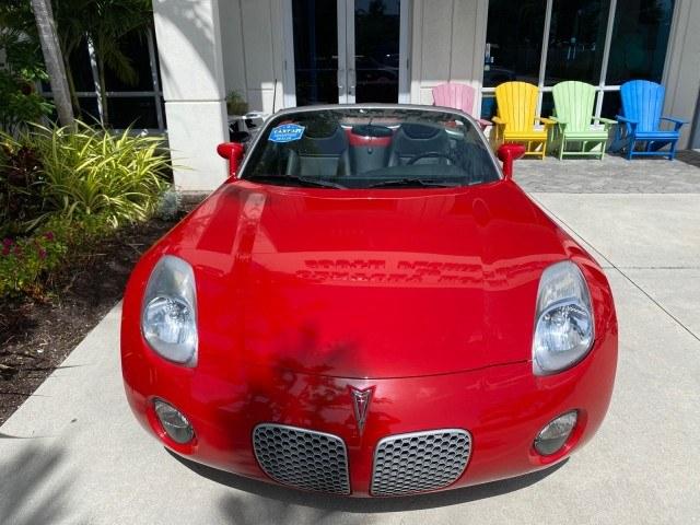 2007 Aggressive (Victory Red) /Ebony Pontiac Solstice LOW MILES 38,147 5SPD AC (1G2MB35B77Y) with an Ecotec 2.4L VVT DOHC 4-Cyl SFI Aluminum Engine engine, Manual transmission, located at 4701 North Dixie Hwy, Pompano Beach, FL, 33064, (954) 422-2889, 26.240938, -80.123474 - OUR WEBPAGE FLORIDACARS1.COM HAS OVER 100 PHOTOS AND FREE CARFAX LINK 2007 Pontiac Solstice Convertible 2.4L I4 F DOHC Gasoline 28 MPG Rear Wheel Drive Features Air Conditioning Alloy Wheels AM/FM Stereo Auxiliary Audio Input CD Audio Cruise Control Leather Seats Manual Transmission Power Locks Powe- Photo#86