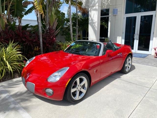 2007 Aggressive (Victory Red) /Ebony Pontiac Solstice LOW MILES 38,147 5SPD AC (1G2MB35B77Y) with an Ecotec 2.4L VVT DOHC 4-Cyl SFI Aluminum Engine engine, Manual transmission, located at 4701 North Dixie Hwy, Pompano Beach, FL, 33064, (954) 422-2889, 26.240938, -80.123474 - OUR WEBPAGE FLORIDACARS1.COM HAS OVER 100 PHOTOS AND FREE CARFAX LINK 2007 Pontiac Solstice Convertible 2.4L I4 F DOHC Gasoline 28 MPG Rear Wheel Drive Features Air Conditioning Alloy Wheels AM/FM Stereo Auxiliary Audio Input CD Audio Cruise Control Leather Seats Manual Transmission Power Locks Powe- Photo#87