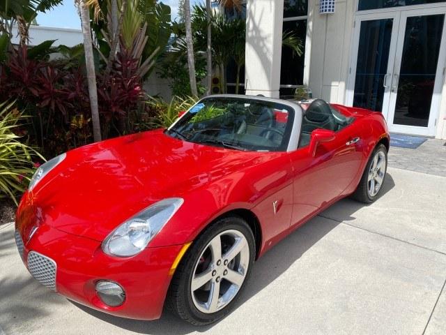 2007 Aggressive (Victory Red) /Ebony Pontiac Solstice LOW MILES 38,147 5SPD AC (1G2MB35B77Y) with an Ecotec 2.4L VVT DOHC 4-Cyl SFI Aluminum Engine engine, Manual transmission, located at 4701 North Dixie Hwy, Pompano Beach, FL, 33064, (954) 422-2889, 26.240938, -80.123474 - OUR WEBPAGE FLORIDACARS1.COM HAS OVER 100 PHOTOS AND FREE CARFAX LINK 2007 Pontiac Solstice Convertible 2.4L I4 F DOHC Gasoline 28 MPG Rear Wheel Drive Features Air Conditioning Alloy Wheels AM/FM Stereo Auxiliary Audio Input CD Audio Cruise Control Leather Seats Manual Transmission Power Locks Powe- Photo#88