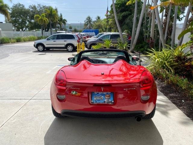 2007 Aggressive (Victory Red) /Ebony Pontiac Solstice LOW MILES 38,147 5SPD AC (1G2MB35B77Y) with an Ecotec 2.4L VVT DOHC 4-Cyl SFI Aluminum Engine engine, Manual transmission, located at 4701 North Dixie Hwy, Pompano Beach, FL, 33064, (954) 422-2889, 26.240938, -80.123474 - OUR WEBPAGE FLORIDACARS1.COM HAS OVER 100 PHOTOS AND FREE CARFAX LINK 2007 Pontiac Solstice Convertible 2.4L I4 F DOHC Gasoline 28 MPG Rear Wheel Drive Features Air Conditioning Alloy Wheels AM/FM Stereo Auxiliary Audio Input CD Audio Cruise Control Leather Seats Manual Transmission Power Locks Powe- Photo#93