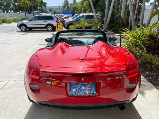 2007 Aggressive (Victory Red) /Ebony Pontiac Solstice LOW MILES 38,147 5SPD AC (1G2MB35B77Y) with an Ecotec 2.4L VVT DOHC 4-Cyl SFI Aluminum Engine engine, Manual transmission, located at 4701 North Dixie Hwy, Pompano Beach, FL, 33064, (954) 422-2889, 26.240938, -80.123474 - OUR WEBPAGE FLORIDACARS1.COM HAS OVER 100 PHOTOS AND FREE CARFAX LINK 2007 Pontiac Solstice Convertible 2.4L I4 F DOHC Gasoline 28 MPG Rear Wheel Drive Features Air Conditioning Alloy Wheels AM/FM Stereo Auxiliary Audio Input CD Audio Cruise Control Leather Seats Manual Transmission Power Locks Powe- Photo#94