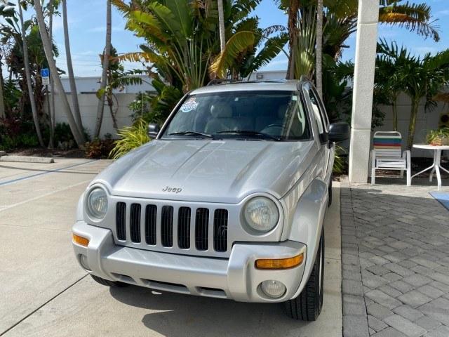 2004 Bright Silver Metallic /Taupe Jeep Liberty Limited 1 OWNER SUNROOF (1J4GK58K24W) with an 3.7L DOHC V6 Power Tech Engine engine, Automatic transmission, located at 4701 North Dixie Hwy, Pompano Beach, FL, 33064, (954) 422-2889, 26.240938, -80.123474 - OUR WEBPAGE FLORIDACARS1.COM HAS OVER 100 PHOTOS AND FREE CARFAX LINK 2004 Jeep Liberty Limited 1 OWNER 4 Door Wagon/Sport Utility 3.7L V6 F Gasoline 23 MPG Rear Wheel Drive Features Air Conditioning Alloy Wheels AM/FM Stereo Automatic Transmission CD Audio Cloth Seats Cruise Control Power Locks Pow- Photo#3