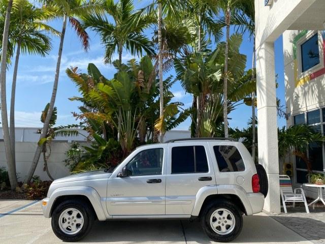 2004 Bright Silver Metallic /Taupe Jeep Liberty Limited 1 OWNER SUNROOF (1J4GK58K24W) with an 3.7L DOHC V6 Power Tech Engine engine, Automatic transmission, located at 4701 North Dixie Hwy, Pompano Beach, FL, 33064, (954) 422-2889, 26.240938, -80.123474 - OUR WEBPAGE FLORIDACARS1.COM HAS OVER 100 PHOTOS AND FREE CARFAX LINK 2004 Jeep Liberty Limited 1 OWNER 4 Door Wagon/Sport Utility 3.7L V6 F Gasoline 23 MPG Rear Wheel Drive Features Air Conditioning Alloy Wheels AM/FM Stereo Automatic Transmission CD Audio Cloth Seats Cruise Control Power Locks Pow- Photo#4