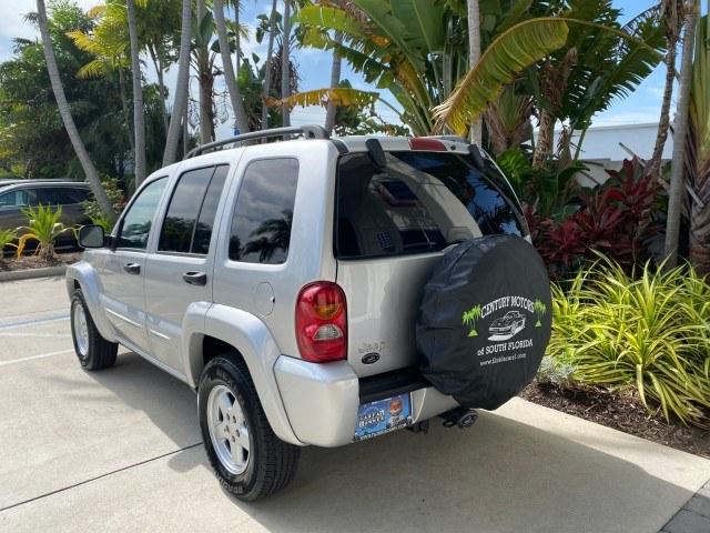 2004 Bright Silver Metallic /Taupe Jeep Liberty Limited 1 OWNER SUNROOF (1J4GK58K24W) with an 3.7L DOHC V6 Power Tech Engine engine, Automatic transmission, located at 4701 North Dixie Hwy, Pompano Beach, FL, 33064, (954) 422-2889, 26.240938, -80.123474 - OUR WEBPAGE FLORIDACARS1.COM HAS OVER 100 PHOTOS AND FREE CARFAX LINK 2004 Jeep Liberty Limited 1 OWNER 4 Door Wagon/Sport Utility 3.7L V6 F Gasoline 23 MPG Rear Wheel Drive Features Air Conditioning Alloy Wheels AM/FM Stereo Automatic Transmission CD Audio Cloth Seats Cruise Control Power Locks Pow- Photo#5