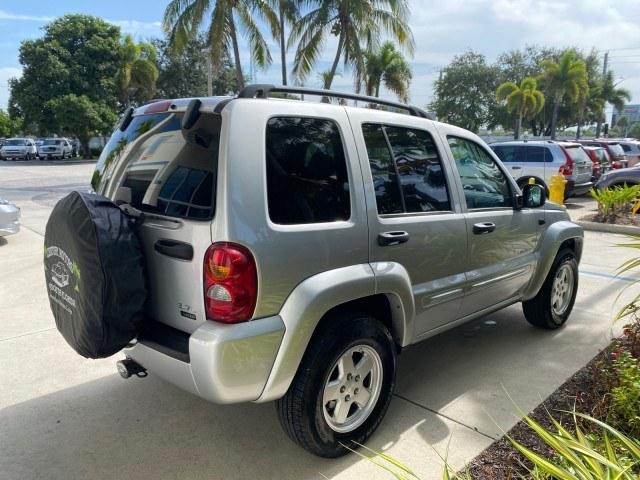 2004 Bright Silver Metallic /Taupe Jeep Liberty Limited 1 OWNER SUNROOF (1J4GK58K24W) with an 3.7L DOHC V6 Power Tech Engine engine, Automatic transmission, located at 4701 North Dixie Hwy, Pompano Beach, FL, 33064, (954) 422-2889, 26.240938, -80.123474 - OUR WEBPAGE FLORIDACARS1.COM HAS OVER 100 PHOTOS AND FREE CARFAX LINK 2004 Jeep Liberty Limited 1 OWNER 4 Door Wagon/Sport Utility 3.7L V6 F Gasoline 23 MPG Rear Wheel Drive Features Air Conditioning Alloy Wheels AM/FM Stereo Automatic Transmission CD Audio Cloth Seats Cruise Control Power Locks Pow- Photo#7