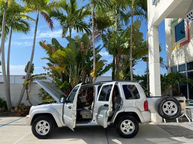 2004 Bright Silver Metallic /Taupe Jeep Liberty Limited 1 OWNER SUNROOF (1J4GK58K24W) with an 3.7L DOHC V6 Power Tech Engine engine, Automatic transmission, located at 4701 North Dixie Hwy, Pompano Beach, FL, 33064, (954) 422-2889, 26.240938, -80.123474 - OUR WEBPAGE FLORIDACARS1.COM HAS OVER 100 PHOTOS AND FREE CARFAX LINK 2004 Jeep Liberty Limited 1 OWNER 4 Door Wagon/Sport Utility 3.7L V6 F Gasoline 23 MPG Rear Wheel Drive Features Air Conditioning Alloy Wheels AM/FM Stereo Automatic Transmission CD Audio Cloth Seats Cruise Control Power Locks Pow- Photo#8