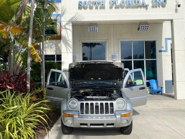 2004 Bright Silver Metallic /Taupe Jeep Liberty Limited 1 OWNER SUNROOF (1J4GK58K24W) with an 3.7L DOHC V6 Power Tech Engine engine, Automatic transmission, located at 4701 North Dixie Hwy, Pompano Beach, FL, 33064, (954) 422-2889, 26.240938, -80.123474 - OUR WEBPAGE FLORIDACARS1.COM HAS OVER 100 PHOTOS AND FREE CARFAX LINK 2004 Jeep Liberty Limited 1 OWNER 4 Door Wagon/Sport Utility 3.7L V6 F Gasoline 23 MPG Rear Wheel Drive Features Air Conditioning Alloy Wheels AM/FM Stereo Automatic Transmission CD Audio Cloth Seats Cruise Control Power Locks Pow- Photo#16