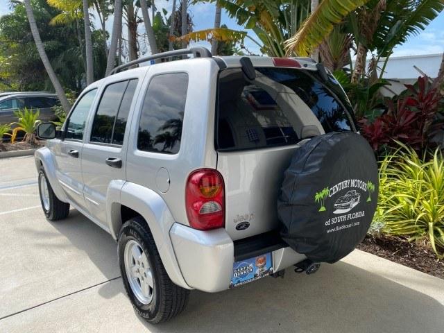 2004 Bright Silver Metallic /Taupe Jeep Liberty Limited 1 OWNER SUNROOF (1J4GK58K24W) with an 3.7L DOHC V6 Power Tech Engine engine, Automatic transmission, located at 4701 North Dixie Hwy, Pompano Beach, FL, 33064, (954) 422-2889, 26.240938, -80.123474 - OUR WEBPAGE FLORIDACARS1.COM HAS OVER 100 PHOTOS AND FREE CARFAX LINK 2004 Jeep Liberty Limited 1 OWNER 4 Door Wagon/Sport Utility 3.7L V6 F Gasoline 23 MPG Rear Wheel Drive Features Air Conditioning Alloy Wheels AM/FM Stereo Automatic Transmission CD Audio Cloth Seats Cruise Control Power Locks Pow- Photo#33
