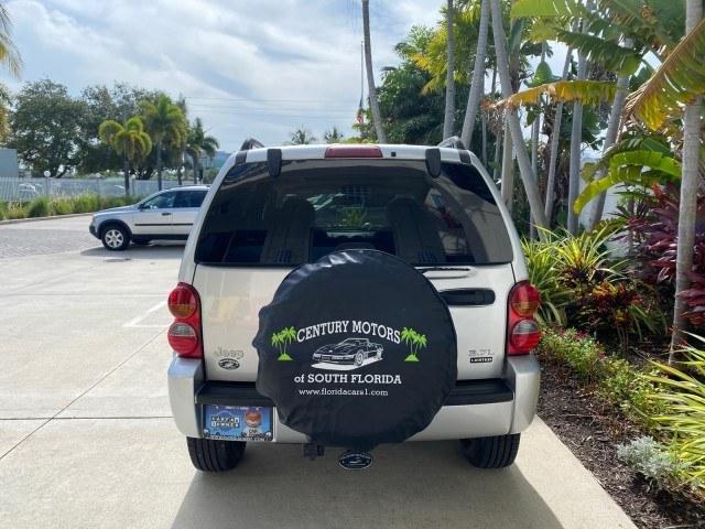 2004 Bright Silver Metallic /Taupe Jeep Liberty Limited 1 OWNER SUNROOF (1J4GK58K24W) with an 3.7L DOHC V6 Power Tech Engine engine, Automatic transmission, located at 4701 North Dixie Hwy, Pompano Beach, FL, 33064, (954) 422-2889, 26.240938, -80.123474 - OUR WEBPAGE FLORIDACARS1.COM HAS OVER 100 PHOTOS AND FREE CARFAX LINK 2004 Jeep Liberty Limited 1 OWNER 4 Door Wagon/Sport Utility 3.7L V6 F Gasoline 23 MPG Rear Wheel Drive Features Air Conditioning Alloy Wheels AM/FM Stereo Automatic Transmission CD Audio Cloth Seats Cruise Control Power Locks Pow- Photo#34