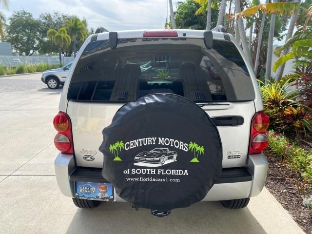 2004 Bright Silver Metallic /Taupe Jeep Liberty Limited 1 OWNER SUNROOF (1J4GK58K24W) with an 3.7L DOHC V6 Power Tech Engine engine, Automatic transmission, located at 4701 North Dixie Hwy, Pompano Beach, FL, 33064, (954) 422-2889, 26.240938, -80.123474 - OUR WEBPAGE FLORIDACARS1.COM HAS OVER 100 PHOTOS AND FREE CARFAX LINK 2004 Jeep Liberty Limited 1 OWNER 4 Door Wagon/Sport Utility 3.7L V6 F Gasoline 23 MPG Rear Wheel Drive Features Air Conditioning Alloy Wheels AM/FM Stereo Automatic Transmission CD Audio Cloth Seats Cruise Control Power Locks Pow- Photo#35