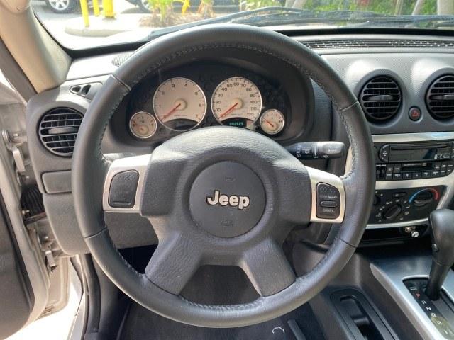 2004 Bright Silver Metallic /Taupe Jeep Liberty Limited 1 OWNER SUNROOF (1J4GK58K24W) with an 3.7L DOHC V6 Power Tech Engine engine, Automatic transmission, located at 4701 North Dixie Hwy, Pompano Beach, FL, 33064, (954) 422-2889, 26.240938, -80.123474 - OUR WEBPAGE FLORIDACARS1.COM HAS OVER 100 PHOTOS AND FREE CARFAX LINK 2004 Jeep Liberty Limited 1 OWNER 4 Door Wagon/Sport Utility 3.7L V6 F Gasoline 23 MPG Rear Wheel Drive Features Air Conditioning Alloy Wheels AM/FM Stereo Automatic Transmission CD Audio Cloth Seats Cruise Control Power Locks Pow- Photo#49