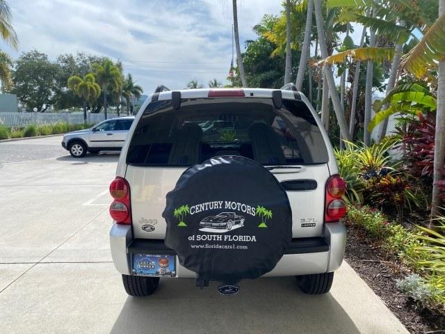 2004 Bright Silver Metallic /Taupe Jeep Liberty Limited 1 OWNER SUNROOF (1J4GK58K24W) with an 3.7L DOHC V6 Power Tech Engine engine, Automatic transmission, located at 4701 North Dixie Hwy, Pompano Beach, FL, 33064, (954) 422-2889, 26.240938, -80.123474 - OUR WEBPAGE FLORIDACARS1.COM HAS OVER 100 PHOTOS AND FREE CARFAX LINK 2004 Jeep Liberty Limited 1 OWNER 4 Door Wagon/Sport Utility 3.7L V6 F Gasoline 23 MPG Rear Wheel Drive Features Air Conditioning Alloy Wheels AM/FM Stereo Automatic Transmission CD Audio Cloth Seats Cruise Control Power Locks Pow- Photo#92