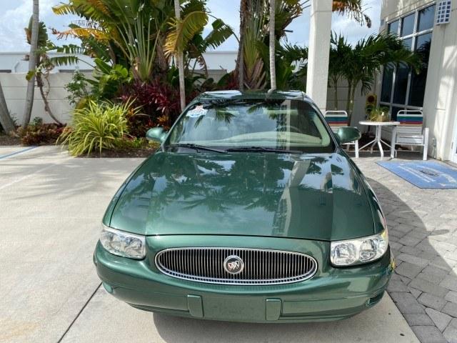 2003 Jade Green Metallic /Taupe Buick LeSabre Custom 1 OWNER LEATHER LOW MILES 89,057 (1G4HP52K13U) with an 3.8L 3800 V6 SFI Engine engine, Automatic transmission, located at 4701 North Dixie Hwy, Pompano Beach, FL, 33064, (954) 422-2889, 26.240938, -80.123474 - OUR WEBPAGE FLORIDACARS1.COM HAS OVER 100 PHOTOS AND FREE CARFAX LINK 2003 Buick Lesabre Custom 1 OWNER Sedan 4 DR 3.8L V6 F 12V Gasoline 29 MPG Front Wheel Drive Features ABS Brakes Air Conditioning Alloy Wheels AM/FM Stereo Automatic Transmission CD Audio Cruise Control Leather Seats Power Locks P- Photo#2