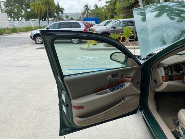 2003 Jade Green Metallic /Taupe Buick LeSabre Custom 1 OWNER LEATHER LOW MILES 89,057 (1G4HP52K13U) with an 3.8L 3800 V6 SFI Engine engine, Automatic transmission, located at 4701 North Dixie Hwy, Pompano Beach, FL, 33064, (954) 422-2889, 26.240938, -80.123474 - OUR WEBPAGE FLORIDACARS1.COM HAS OVER 100 PHOTOS AND FREE CARFAX LINK 2003 Buick Lesabre Custom 1 OWNER Sedan 4 DR 3.8L V6 F 12V Gasoline 29 MPG Front Wheel Drive Features ABS Brakes Air Conditioning Alloy Wheels AM/FM Stereo Automatic Transmission CD Audio Cruise Control Leather Seats Power Locks P- Photo#9