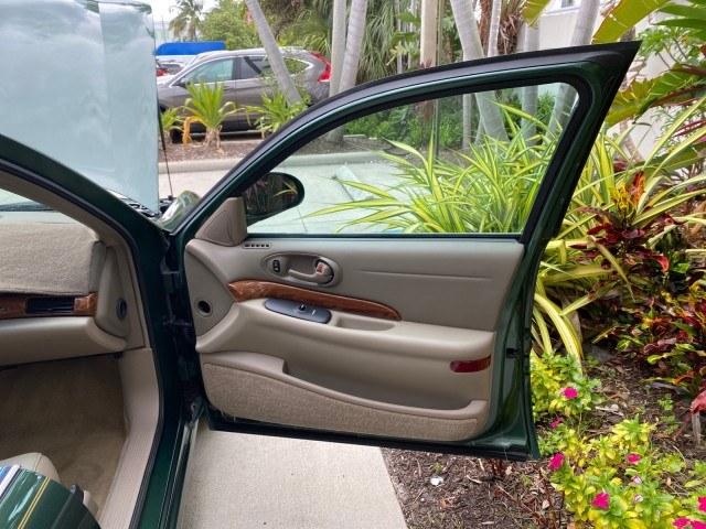 2003 Jade Green Metallic /Taupe Buick LeSabre Custom 1 OWNER LEATHER LOW MILES 89,057 (1G4HP52K13U) with an 3.8L 3800 V6 SFI Engine engine, Automatic transmission, located at 4701 North Dixie Hwy, Pompano Beach, FL, 33064, (954) 422-2889, 26.240938, -80.123474 - OUR WEBPAGE FLORIDACARS1.COM HAS OVER 100 PHOTOS AND FREE CARFAX LINK 2003 Buick Lesabre Custom 1 OWNER Sedan 4 DR 3.8L V6 F 12V Gasoline 29 MPG Front Wheel Drive Features ABS Brakes Air Conditioning Alloy Wheels AM/FM Stereo Automatic Transmission CD Audio Cruise Control Leather Seats Power Locks P- Photo#11