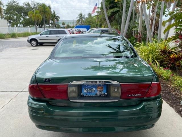 2003 Jade Green Metallic /Taupe Buick LeSabre Custom 1 OWNER LEATHER LOW MILES 89,057 (1G4HP52K13U) with an 3.8L 3800 V6 SFI Engine engine, Automatic transmission, located at 4701 North Dixie Hwy, Pompano Beach, FL, 33064, (954) 422-2889, 26.240938, -80.123474 - OUR WEBPAGE FLORIDACARS1.COM HAS OVER 100 PHOTOS AND FREE CARFAX LINK 2003 Buick Lesabre Custom 1 OWNER Sedan 4 DR 3.8L V6 F 12V Gasoline 29 MPG Front Wheel Drive Features ABS Brakes Air Conditioning Alloy Wheels AM/FM Stereo Automatic Transmission CD Audio Cruise Control Leather Seats Power Locks P- Photo#35