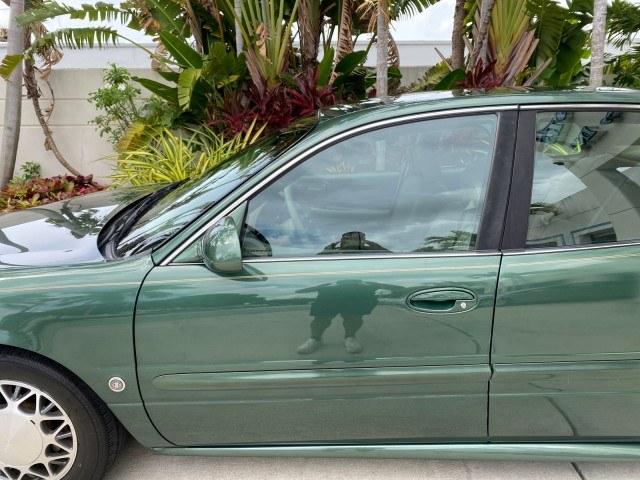 2003 Jade Green Metallic /Taupe Buick LeSabre Custom 1 OWNER LEATHER LOW MILES 89,057 (1G4HP52K13U) with an 3.8L 3800 V6 SFI Engine engine, Automatic transmission, located at 4701 North Dixie Hwy, Pompano Beach, FL, 33064, (954) 422-2889, 26.240938, -80.123474 - OUR WEBPAGE FLORIDACARS1.COM HAS OVER 100 PHOTOS AND FREE CARFAX LINK 2003 Buick Lesabre Custom 1 OWNER Sedan 4 DR 3.8L V6 F 12V Gasoline 29 MPG Front Wheel Drive Features ABS Brakes Air Conditioning Alloy Wheels AM/FM Stereo Automatic Transmission CD Audio Cruise Control Leather Seats Power Locks P- Photo#36