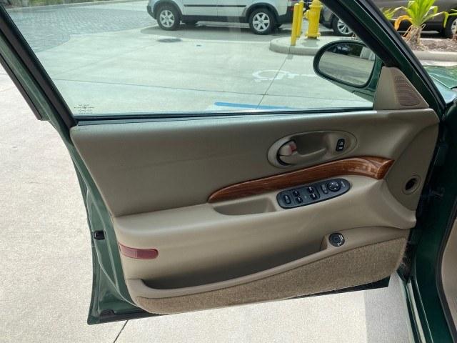 2003 Jade Green Metallic /Taupe Buick LeSabre Custom 1 OWNER LEATHER LOW MILES 89,057 (1G4HP52K13U) with an 3.8L 3800 V6 SFI Engine engine, Automatic transmission, located at 4701 North Dixie Hwy, Pompano Beach, FL, 33064, (954) 422-2889, 26.240938, -80.123474 - OUR WEBPAGE FLORIDACARS1.COM HAS OVER 100 PHOTOS AND FREE CARFAX LINK 2003 Buick Lesabre Custom 1 OWNER Sedan 4 DR 3.8L V6 F 12V Gasoline 29 MPG Front Wheel Drive Features ABS Brakes Air Conditioning Alloy Wheels AM/FM Stereo Automatic Transmission CD Audio Cruise Control Leather Seats Power Locks P- Photo#41
